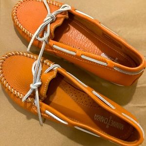 EUC Minnetonka orange leather moccasins